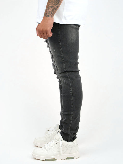 Mens tapered 2025 distressed jeans